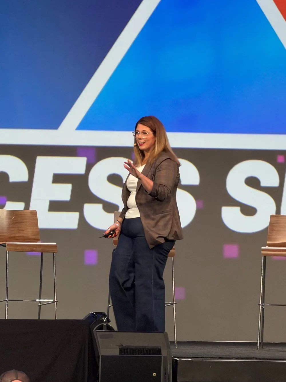Kristi Jencks on stage at Success Summit