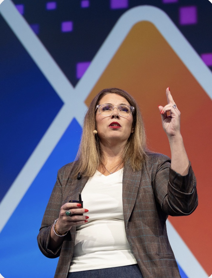 Kristi Jencks speaking on stage